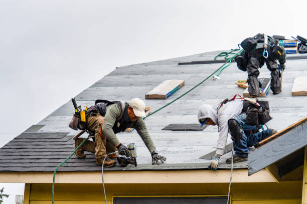 Professional Gutter Installation technician working in Sullivan, NH
